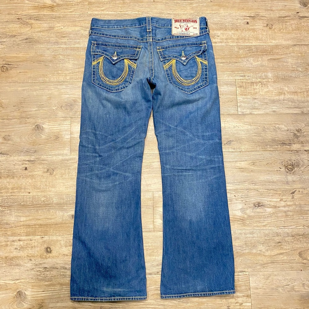True Religion Blue Boot Cut Jeans with Signature Horseshoe Design